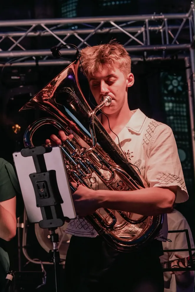 Lois playing tuba at a live gig