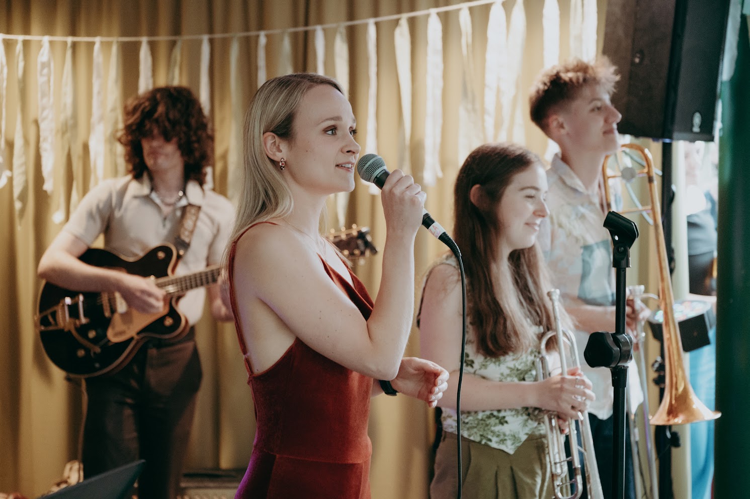 Our singer, Maddie, sings at a wedding in Queens College Cambridge