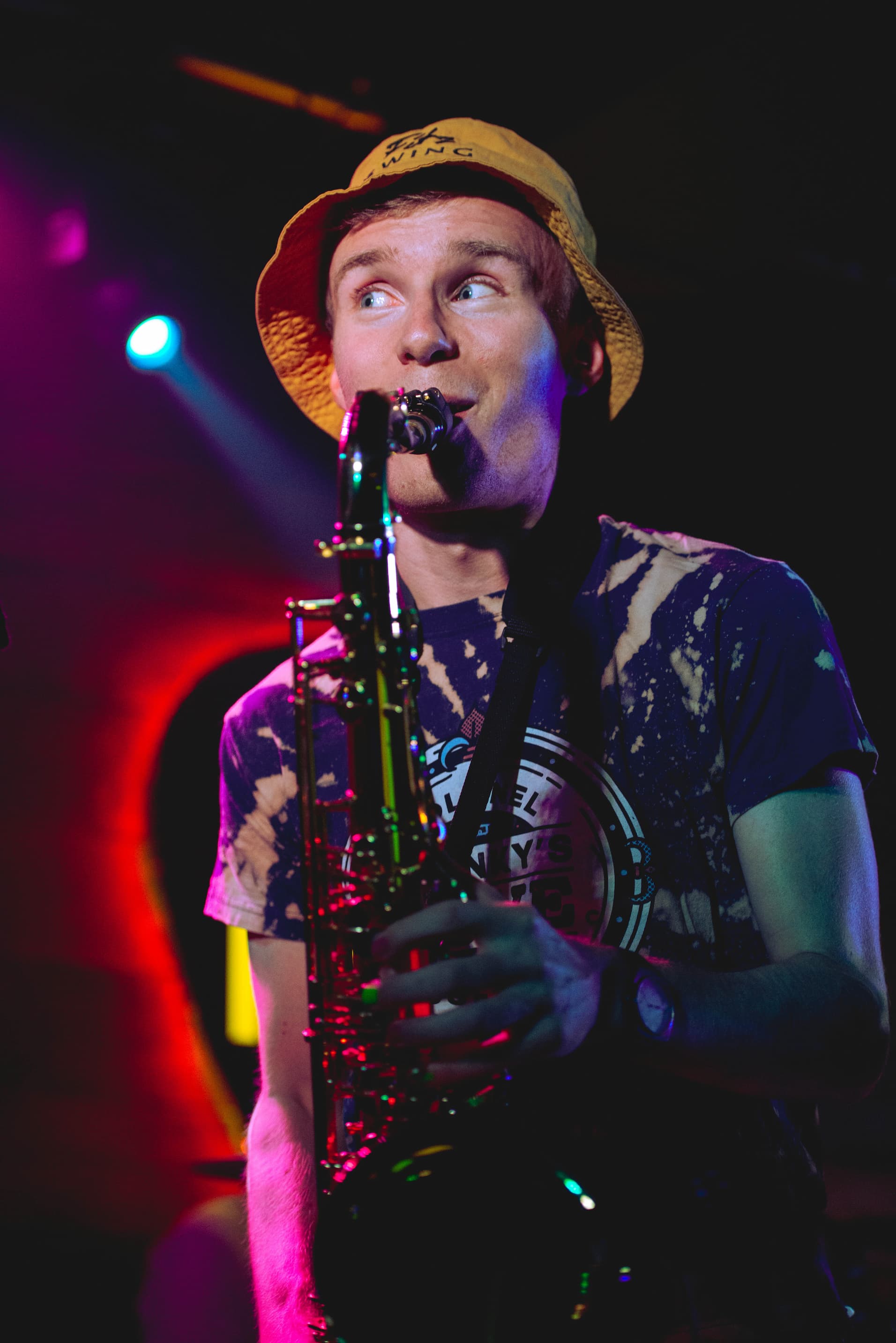 Matt playing saxophone at a live gig