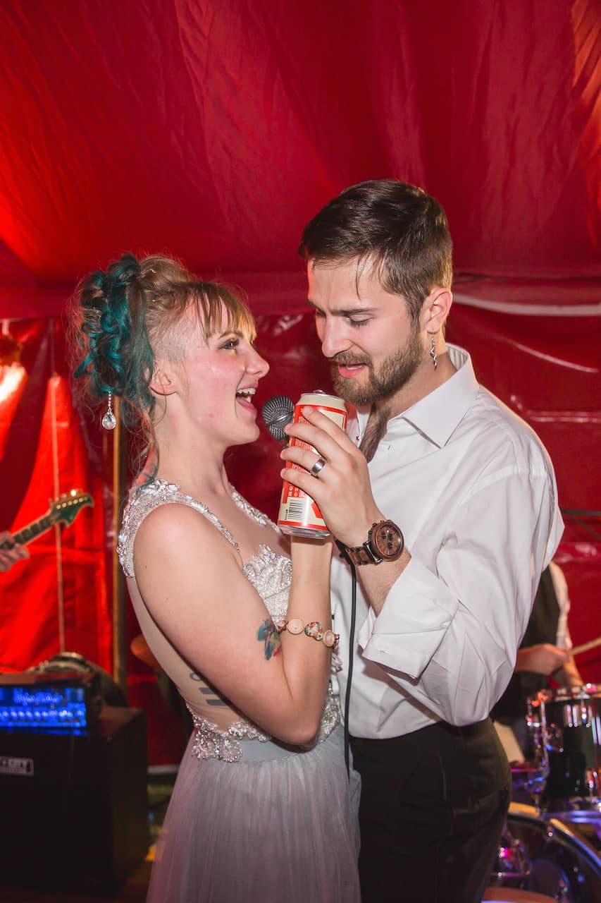 The bride and groom singing at one of our wedding gigs in Norfolk